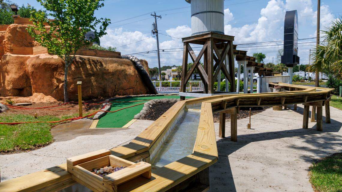 Snake River Golf and Gem Mining, an abandoned mini-golf entertainment complex off Highway 17S in Myrtle Beach has been abandoned for years but will re-open under new ownership soon. A water tower and trough will have running water filled with sand and gems, allowing people to use a tray to sift for items. May 2, 2025.