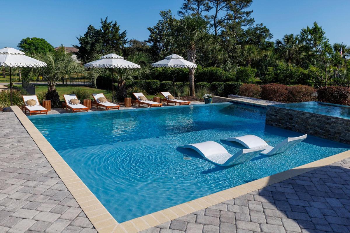 The “Shag House” on Burchap Drive in Myrtle Beach was featured in the 1989 film “Shag: The Movie.” Current owner Maggie Maher has spent 10 years renovating the home but has left touches, like the expansive front porch, as homage to the home’s history. May 1, 2025.