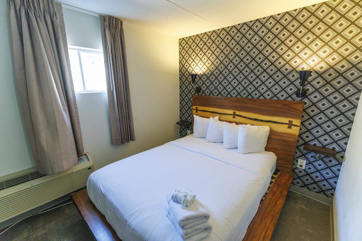 The Holiday Shores, shown here, is the second motel in Myrtle Beach that the Roger Lewis law firm has helped revitalize. The Hawaiian-themed Waikiki Village on Ocean Boulevard reopened in 2018 as a boutique “retro motel.”