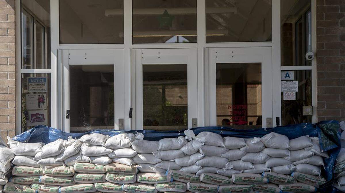Sandbags block entrances to Conway Elementary School to protect it from flooding Thursday Sept. 20, 2018, in Conway, SC. 

