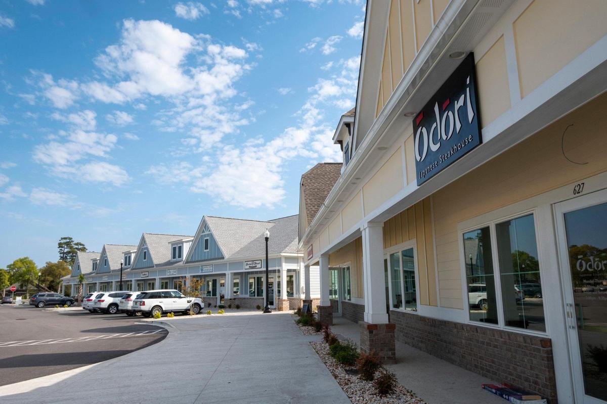 The Shops on Main shopping center on Main Street in North Myrtle Beach has 31 businesses in seven cottage-style buildings and more than 200 parking spaces on a six-acre piece of land. The center has retail businesses, services and restaurants.April 14, 2021.