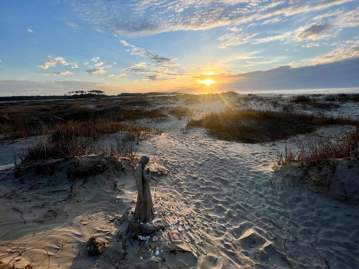 Statue locally known as the ‘Angel of Hope’ in the dunes of the Cherry Grove section of North Myrtle Beach has disappeared. Photo courtesy Marissa Cooper Winstead. April 12, 2022.