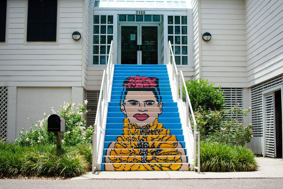 The Myrtle Beach Art Museum painted its front steps with a portrait of Frida Kahlo as part of its summer 2022 exhibit, “The World of Frida.”