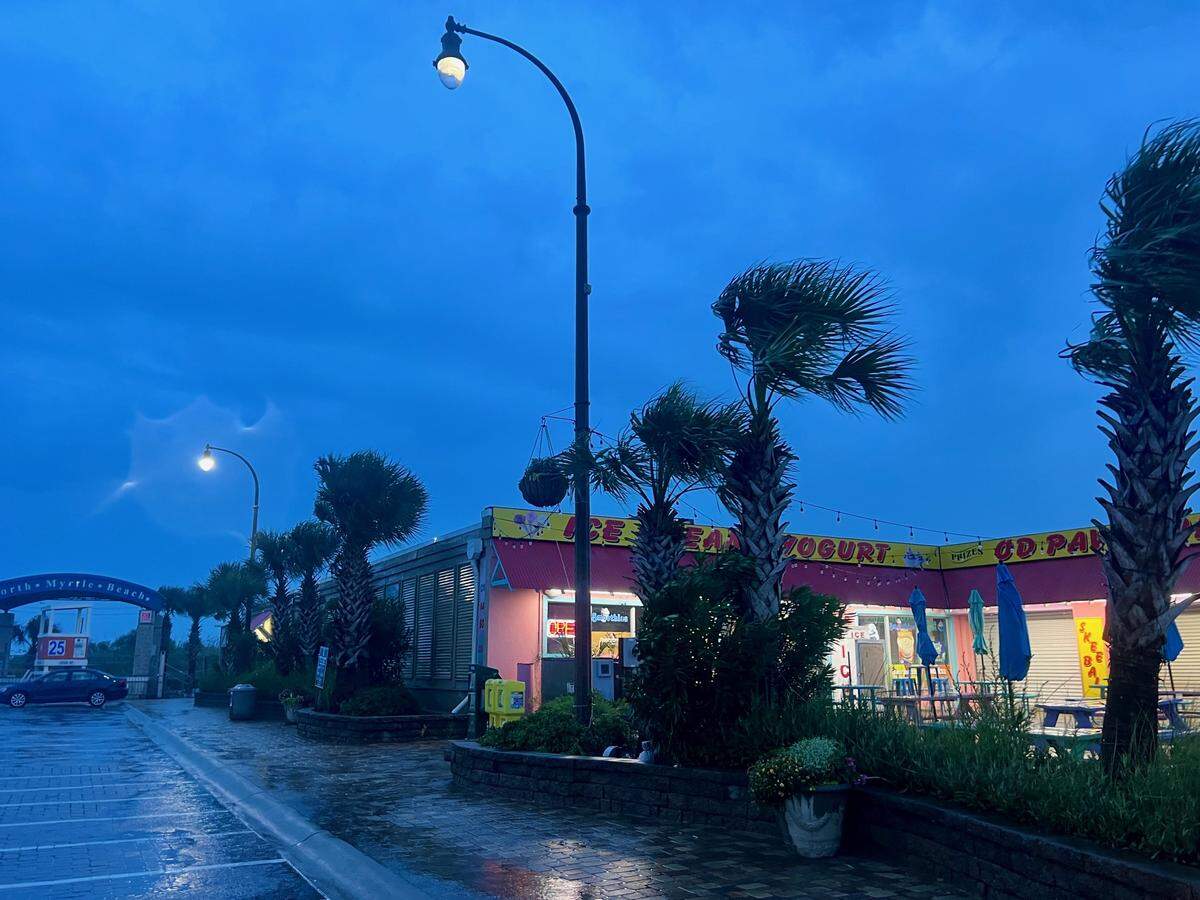 Bands of rain and wind arrive in North Myrtle Beach, SC ahead of Tropical Storm Debby. Jason Lee/The Sun News