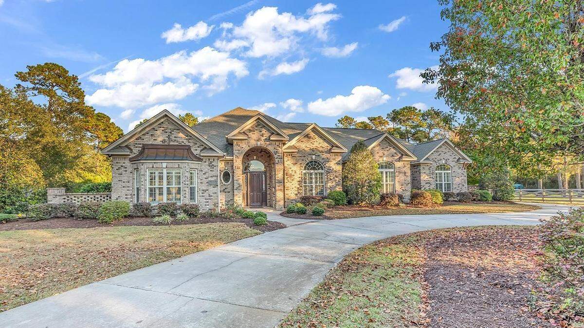 A $1.7 million home in Carolina Forest is for sale. It has an equestrian surprise in the back.