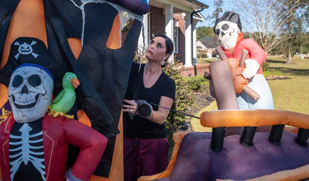 Morgan and Matt Momyer prepared for Halloween 2022 by filling their Claypond Road yard with inflatable displays outside Conway, S.C. October 19, 2022.