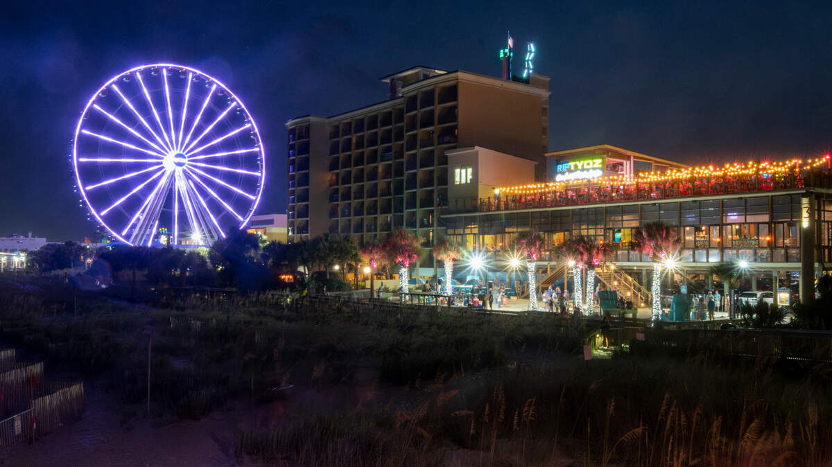 Myrtle Beach landmarks take on a new life under the lights of a summer night. Aug. 2, 2023.