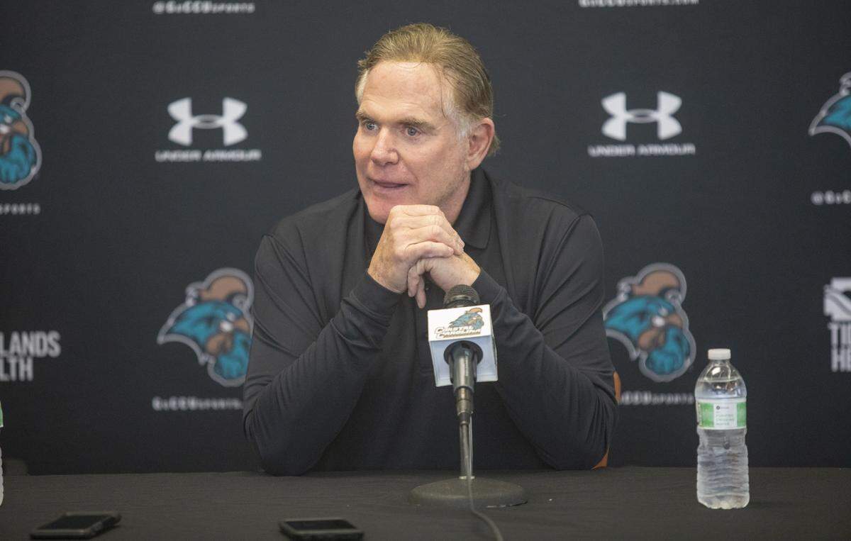 CCU football coach Joe Moglia speaks with the media Friday at Brooks Stadium in Conway. Moglia stepped down as heach coach after seven seasons at CCU.