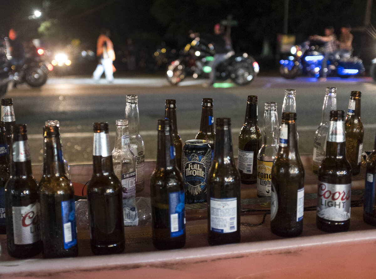 Beer bottles line the barricades in Murrells Inlet on Friday night. Myrtle Beach Bike Week kicked into high gear Murrells Inlet area venues on Friday evening. May 17, 2018. 