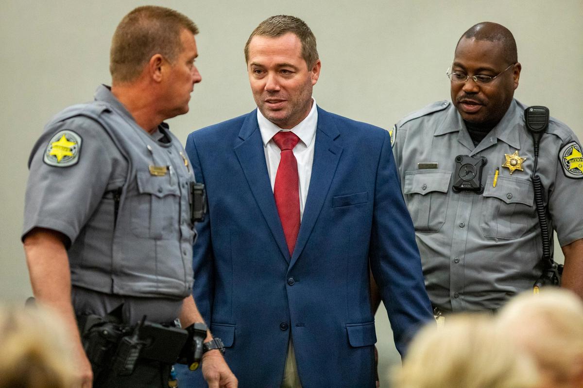 Sidney Moorer speaks with Horry County sheriff’s deputies during the final day of his trial for kidnapping related to the 2013 disappearance of Heather Elvis. Moorer was found guilty on all charges, and sentenced to 30 years in prison.