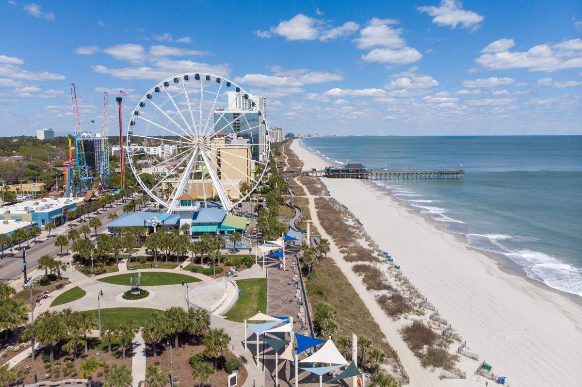 Myrtle Beach Boardwalk and Skywheel looking north. Popular tourist destinations around Myrtle Beach were mostly vacant on Thursday after all amusements and public beach accesses were shut down due to the coronavirus. April 2, 2020