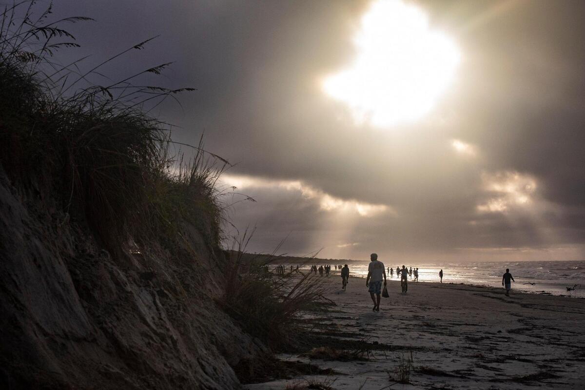 A storm surge from Hurricane Isaias combined with king tides damaged caused damage to the dunes in North Myrtle Beach and collapsed a section of the Sea Cabins Pier on Tuesday. August 4, 2020.