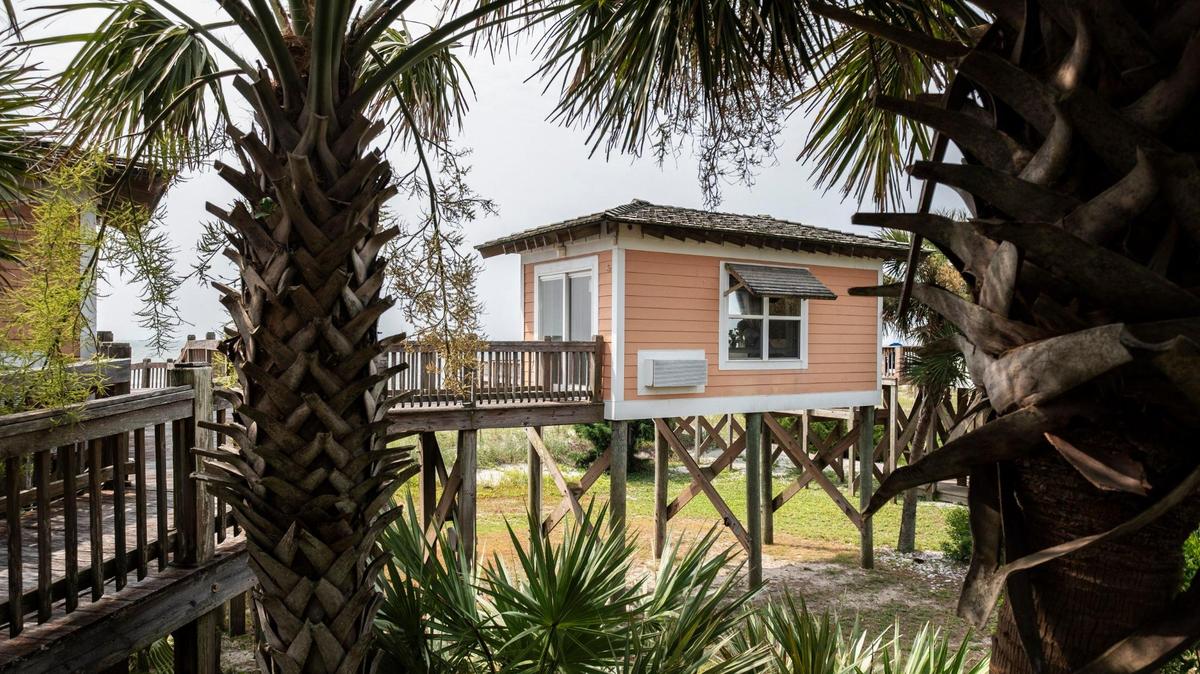 A pair of beach cabanas, two of only about 15 on this unique stretch of Myrtle Beach’s oceanfront know as the cabana section, are currently up for sale. The units are connected by an elevated boardwalk that leads to the Atlantic Ocean. While not for occupancy, owners enjoy a place of refuge on beach days. July 19, 2023.