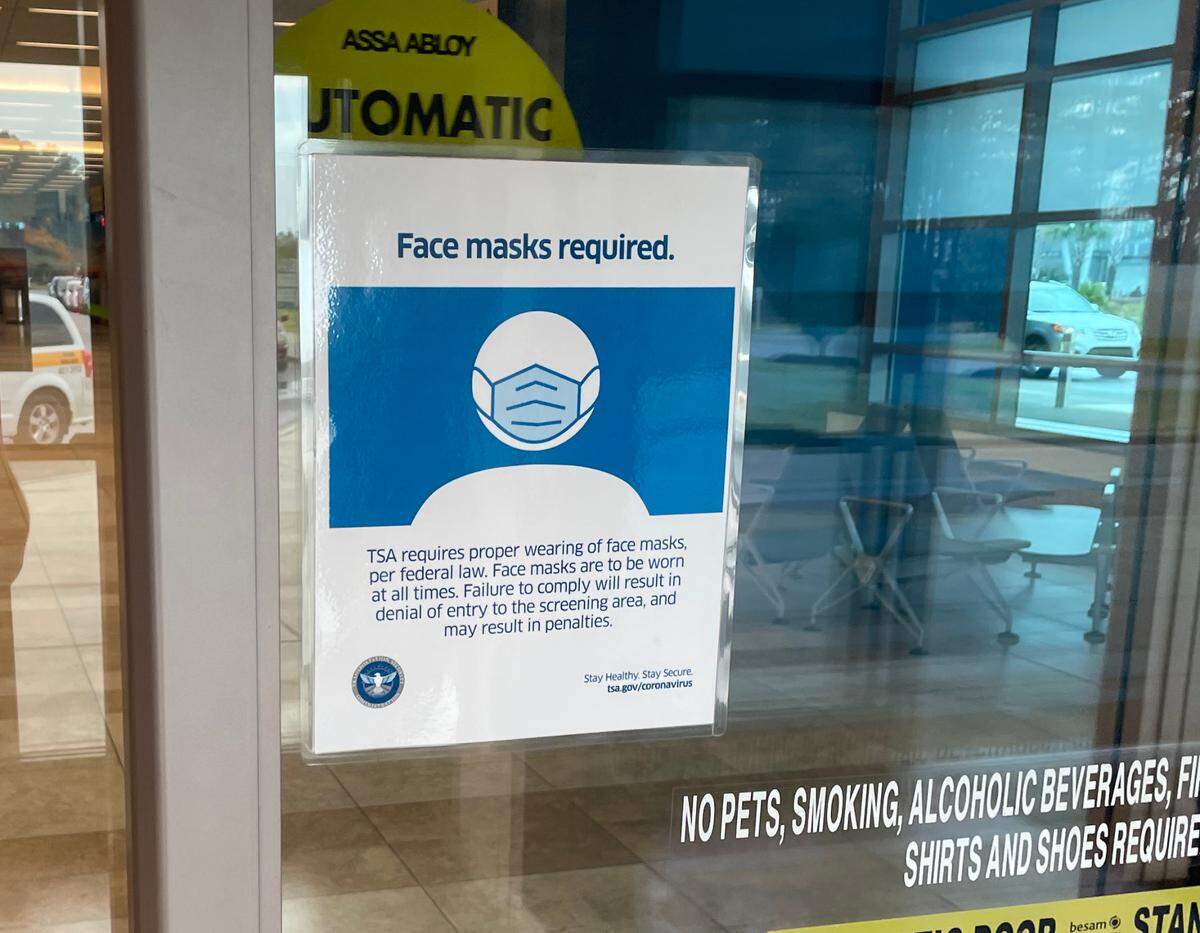A sign at Myrtle Beach International Airport, on March 9, 2022, reminding travelers of the Transportation Security Administration’s mask requirement that went into effect in February 2021. The mandate was struck down April 18 by a federal judge.
