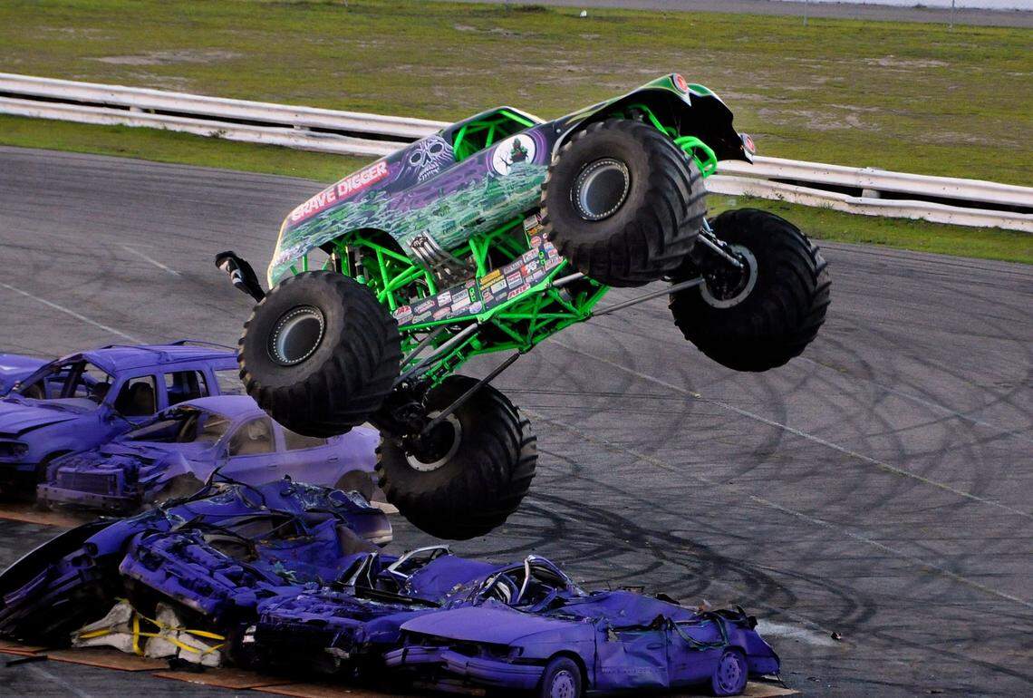 Monster Jam(R) Truck, Four-Time World Champion Grave Digger(R) driven by Randy Brown rolls over a line of cars during the first event, Thursday night during Monster Jam at Myrtle Beach Speedway. Friday will be the Party in the Pits from 4:30-6:00 p.m. which gives fans the opportunity to get a view of the trucks up close and meet the drivers of the massive Monster Jam trucks. The performance will follow at 7:30 p.m.