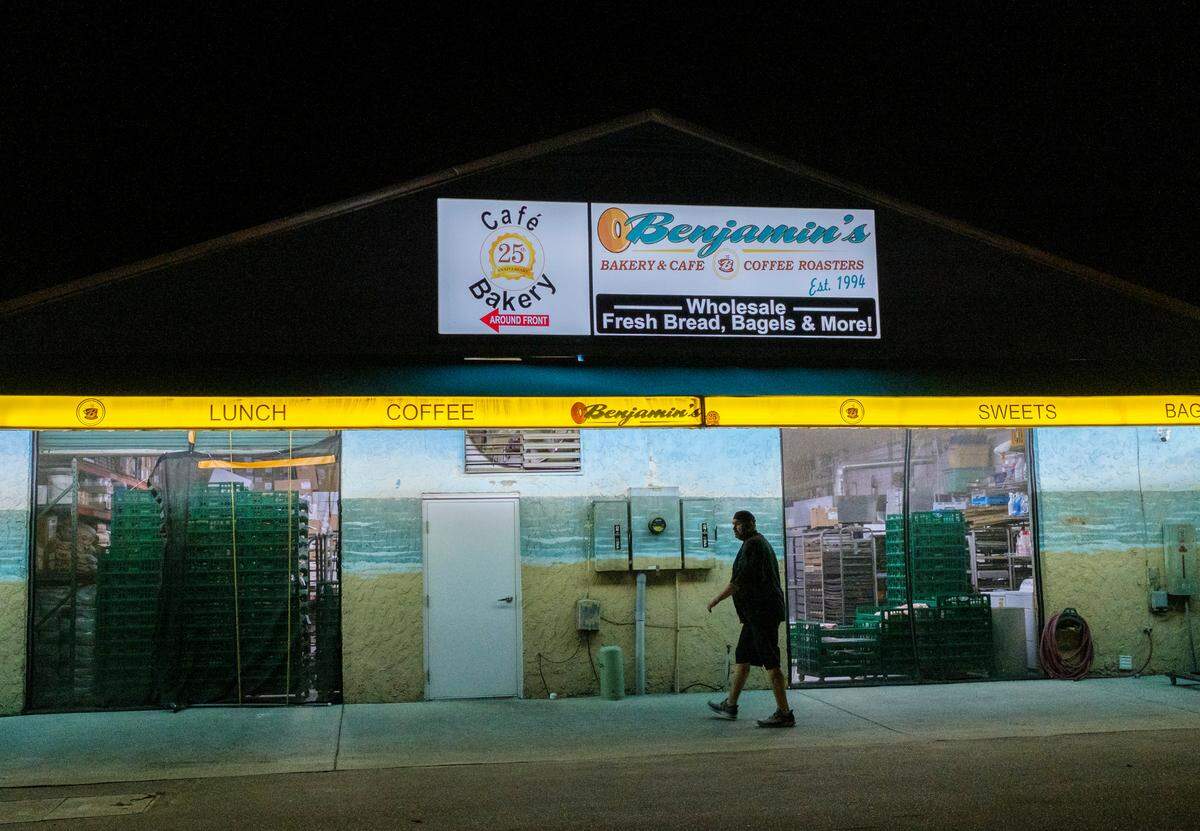 Adrian Baldwin, a baker, works the night shift at Benjamin’s Bakery in Surfside Beach, S.C. Sept. 30, 2021.