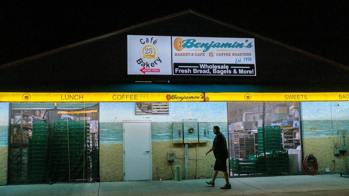 Adrian Baldwin, a baker, works the night shift at Benjamin’s Bakery in Surfside Beach, S.C. Sept. 30, 2021.