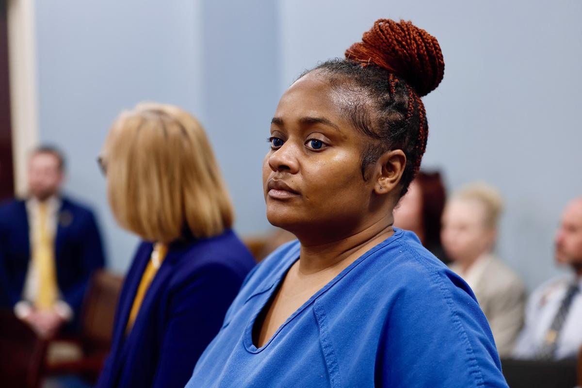 Lakesha Burnett appears during a bond hearing Tuesday, Feb. 10, 2026, at J. Reuben Long Detention Center in Conway, SC. Burnett and her sister are facing charges for threatening to kill their sibling for talking to police about the murder of an 11-year-old girl who was part of a human trafficking ring, forced to conduct unpaid labor at Myrtle Beach area medical centers. The three sisters also face charges related to the murder investigation.