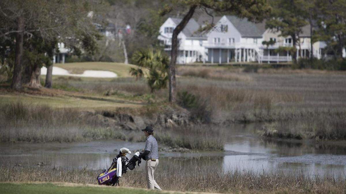 A golfer walks along the 11th fairway at The Dunes Golf and Beach Club in Myrtle Beach, SC. Sun News File Photo from 2018.