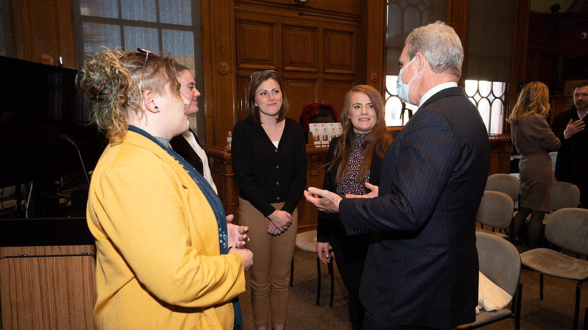 Desiree Demos, far right, graduated from Horry County’s drug treatment program in 2020. She was awarded the J. Gregory Hembree Award at the Aug. 30 drug court graduation. The award is given to a client who has excelled after completing the program.