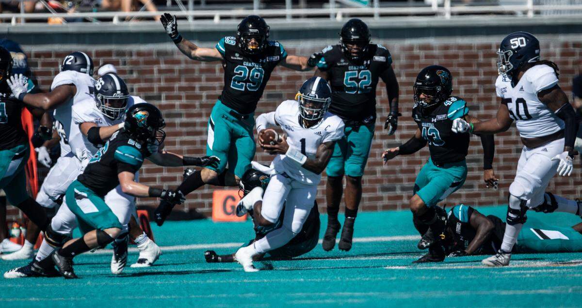 Georgia Southern’s Shai Werts feels the pressure of Coastal’s defense. Coastal Carolina played its first game as a ranked FBS team against Georgia Southern on Saturday at Brooks Stadium in Conway. October 24, 2020.