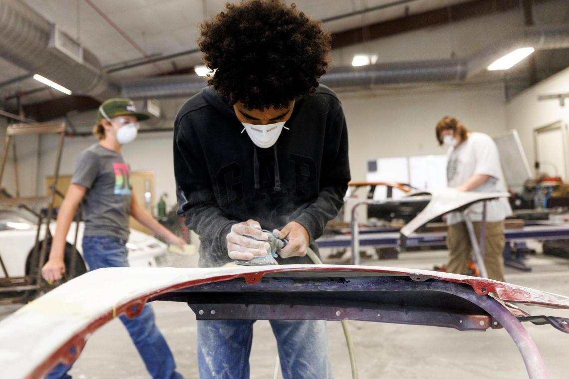 Jeo Hill, a Junior at The Palmetto Academy for Learning Motorsports (PALM) sands a door panel in the Auto Collision Technology shop. PALM is a charter high school in Conway, SC that uses motorsports as a foundation for educating students. In additional to their regular curriculum, high school students work in Welding, Digital Arts & Graphics, Auto Collision Technology and Motor Sports Technology to learn skills that can be applied to various trades. Oct. 30, 2024.