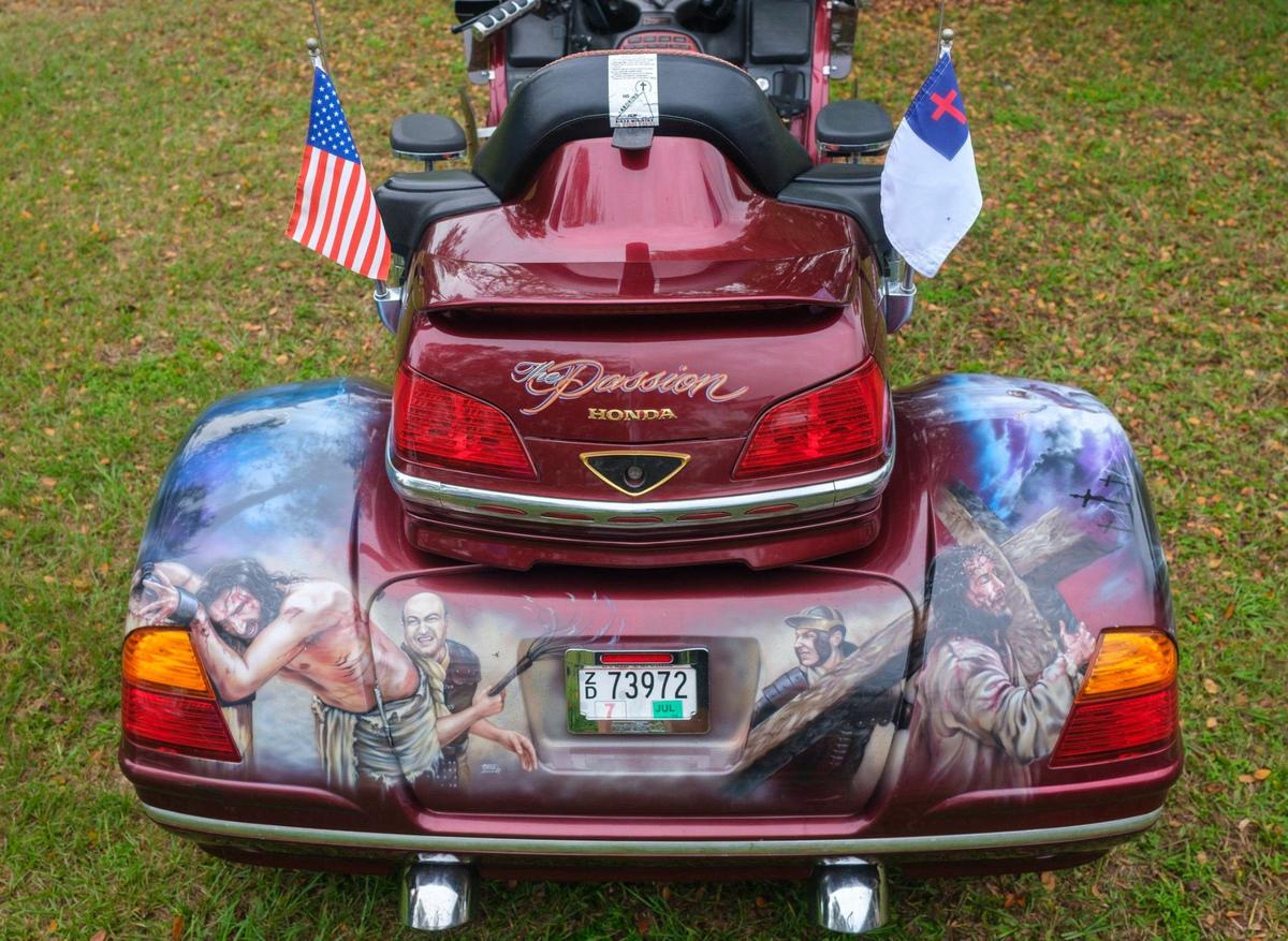 Richard Wilson, an ordained minister, and his wife Rosietta attend Myrtle Beach area motorcycle rallies on their custom airbrushed Honda named “The Passion.” The couple have been ministering Christianity from their bike for around ten years. Sept. 26, 2024.