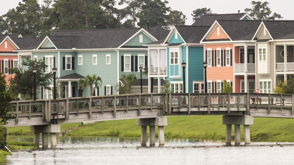 Residential homes line a lake at Market Common on land that once was part of the Myrtle Beach Air Force Base.