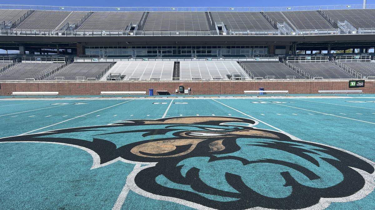 As Coastal Carolina secured a win over Georgia State at the Saturday, Nov. 8, 2025 football game, one fan ran shirtless across the field and was tackled to the ground. TSN Sept. 30, 2024 File. 