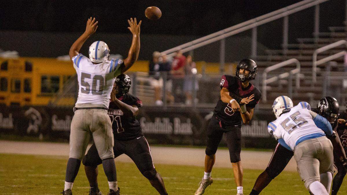 Carolina Forest junior quarterback Mason Garcia throws a pass against the St. James Sharks last season in Myrtle Beach.