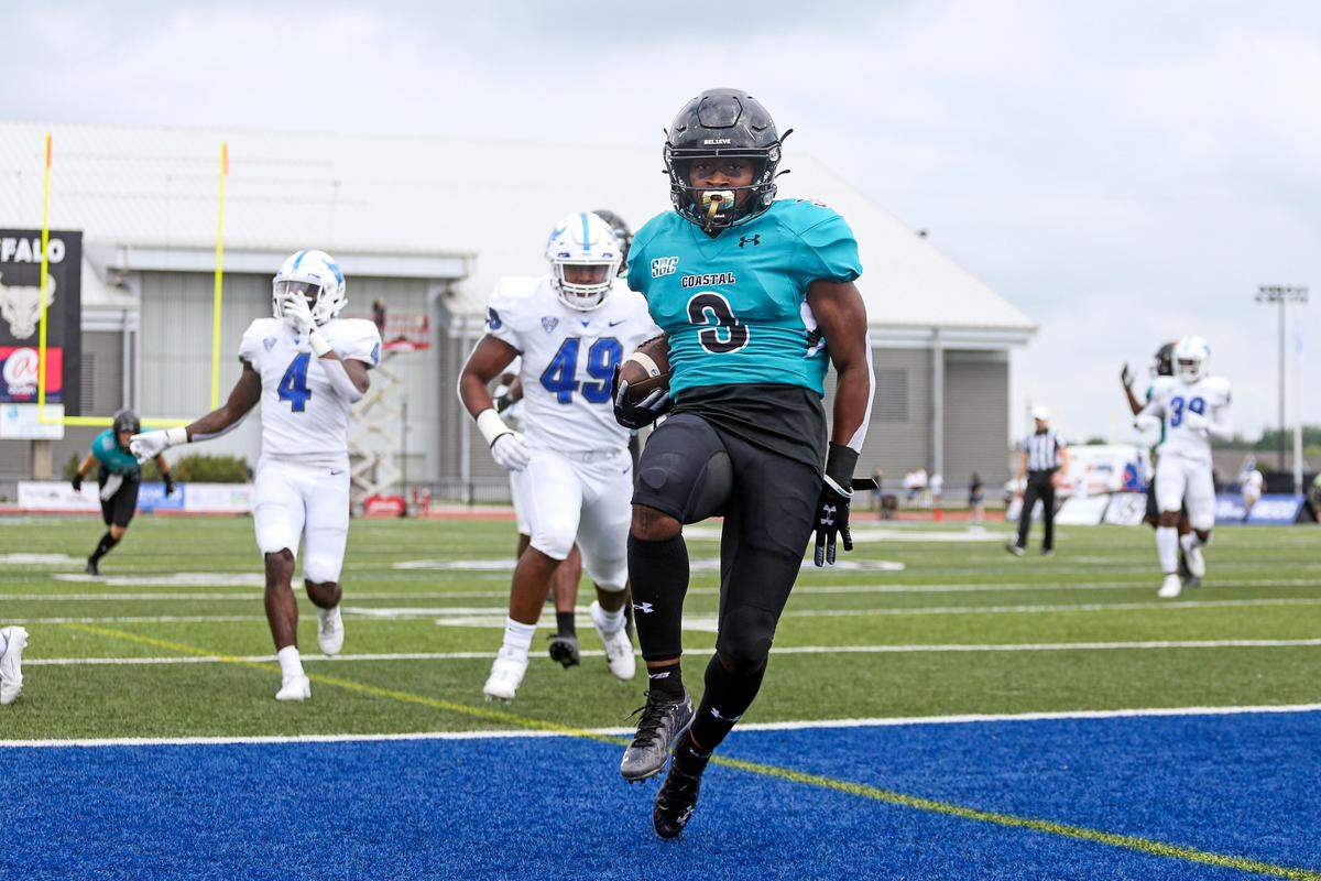 Coastal Carolina wide receiver Aaron Bedgood (3) runs into the end zone for a touchdown during the first half of a NCAA college football game against Buffalo in Buffalo, N.Y. on Saturday, Sept. 18, 2021. (AP Photo/Joshua Bessex)