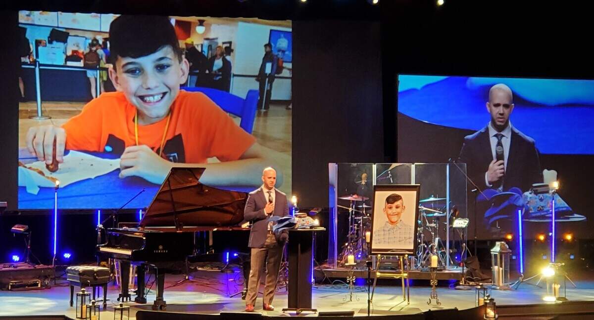 Albert Stauch speaks about his son Landon during a celebration of life ceremony at Beach Church. Landon went missing in Colorado earlier this year and his stepmom has been charged with murder. 