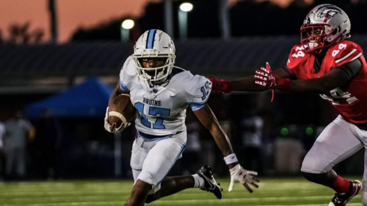 South Florence High School’s Jayden Sellers runs with the football. The junior recently committed to the University of South Carolina.
