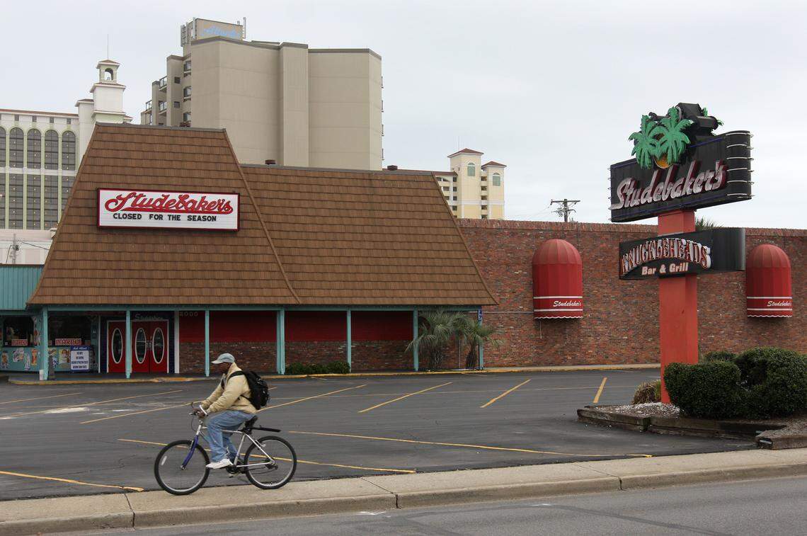 Larry Miller, of Myrtle Beach, rides on his bicycle past Studebaker’s at 2000 N. Kings Hwy. in Myrtle Beach on Sunday, Jan. 24, 2010. Club owner Don Cauthen shut its doors Jan. 9 and said the poor economy, a slow summer and weak traffic during the May bike rallies were to blame. Photo by Sabree Hill