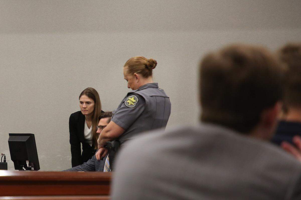 Meagan Jackson checked the computer frequently during a recess on the fourth day of her murder trial.