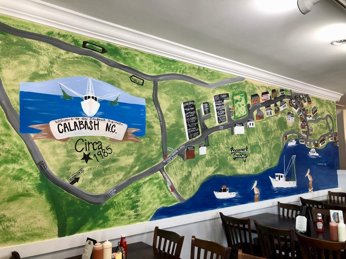 A mural in the dining room of Beck’s Restaurant in Calabash, NC. Calabash-style fried fish can be found in North and South Carolina and beyond. August 2, 2023.