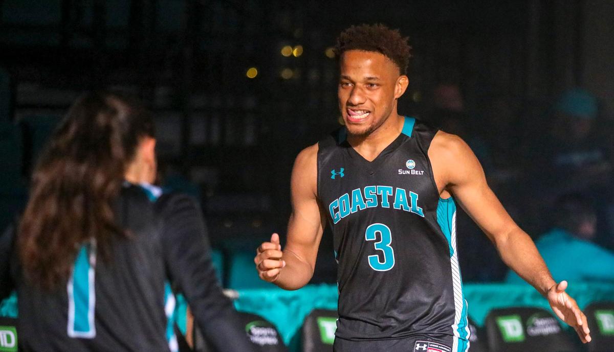 Coastal Carolina guard Devante Jones takes the court at the start of the 2018 CCU Hoopla at the HTC Center in Conway.