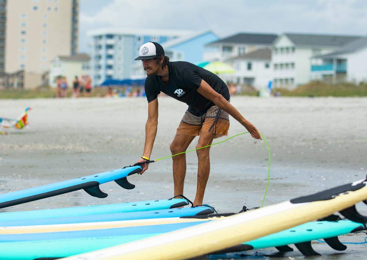 Cameron Sopa was one of more than a dozen volunteers for Take A Kid Surfing Day in North Myrtle Beach on Aug. 7, 2021.