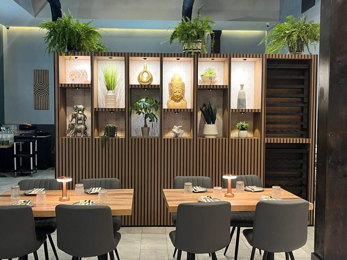 Aura Indian Kitchen serves North and South Indian cuisine in an elevated casual atmosphere.