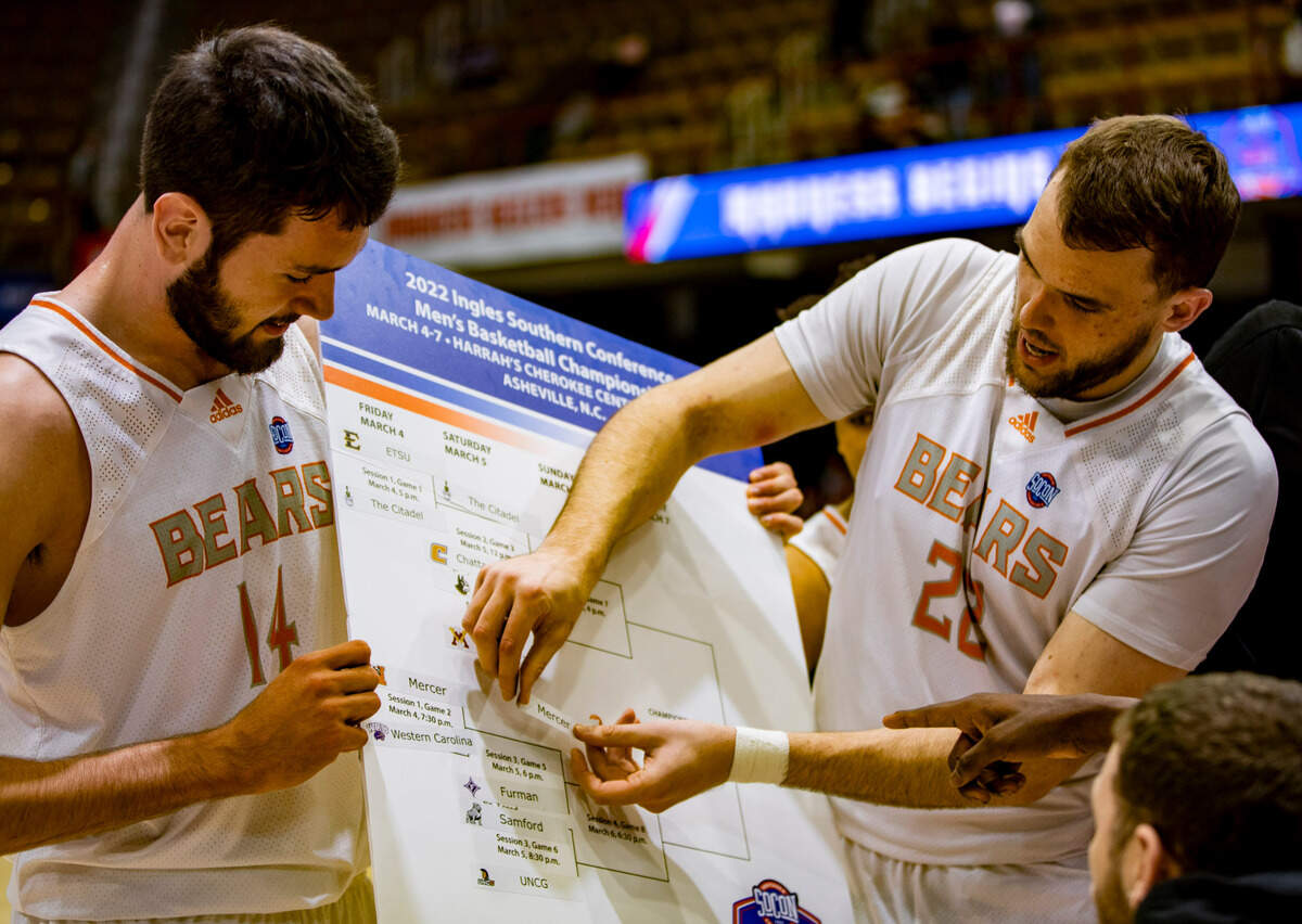 Mercer celebrates after defeating Western Carolina 81-53 Friday night in the SoCon Ingles Basketball Championships at the Harrah’s Cherokee Center in Asheville, N.C.