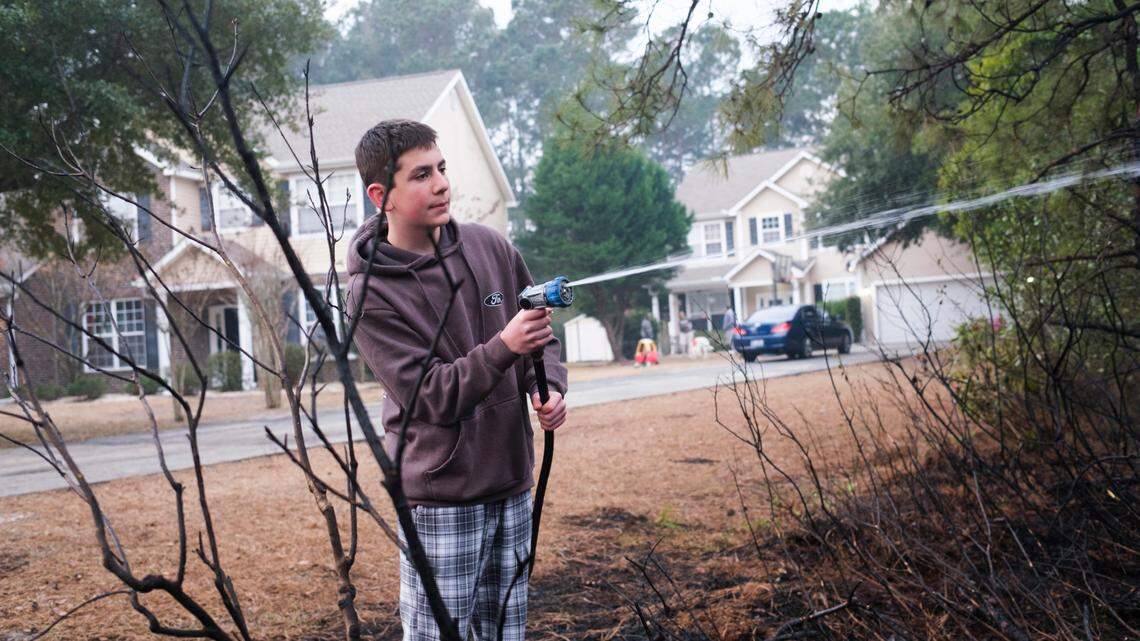 ‘It’s terrifying.’ Carolina Forest residents face wall of fire as crews try to save homes