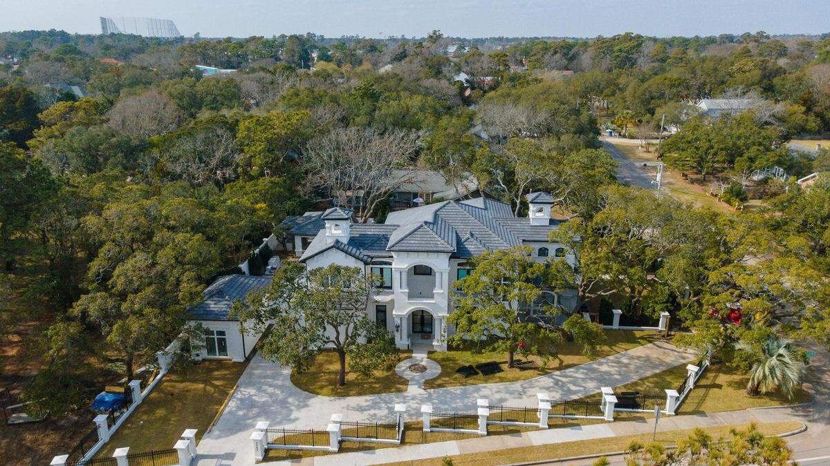 A home on the Myrtle Beach’s Golden Mile, across from the beach, is listed for $3.1 million. It has 6 bedrooms and a 3 car garage.