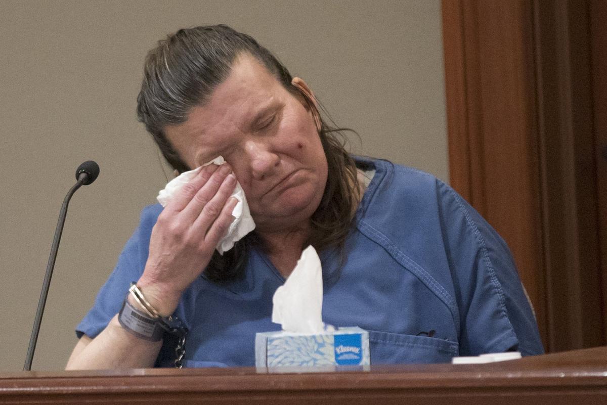 Dianee Durkin cries on the stand during a "stand your ground" hearing on Monday as a 911 tape is played of the altercation that led to the death of Roy Davis.Durkin and James Rosenbaum are accused of murdering Davis by beating him with a baseball bat in July 2016. Durkin and Rosenbaum claim it was in self defense and that Davis attacked Durkin in her their home and that Rosenbaum came to her defense with the bat. Monday was the start of a days long "stand your ground" hearing to determine if the couple may claim immunity from prosecution.