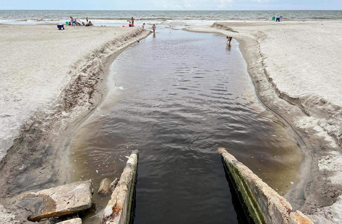 The ‘Cane Patch swash’, an ocean outfall at 68th Avenue North in Myrtle Beach is under a long-term swimming advisory by DHEC. The advisory means that high levels of bacteria might be present, especially following storms or rain. Swimming is not advised within 200 feet in each direction. Aug. 22, 2022.