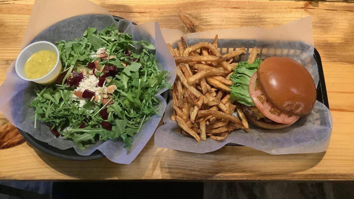 One of three salads and one of five craft burgers offered at Bruiser’s Burgers, which opened this month in Surfside Beach.