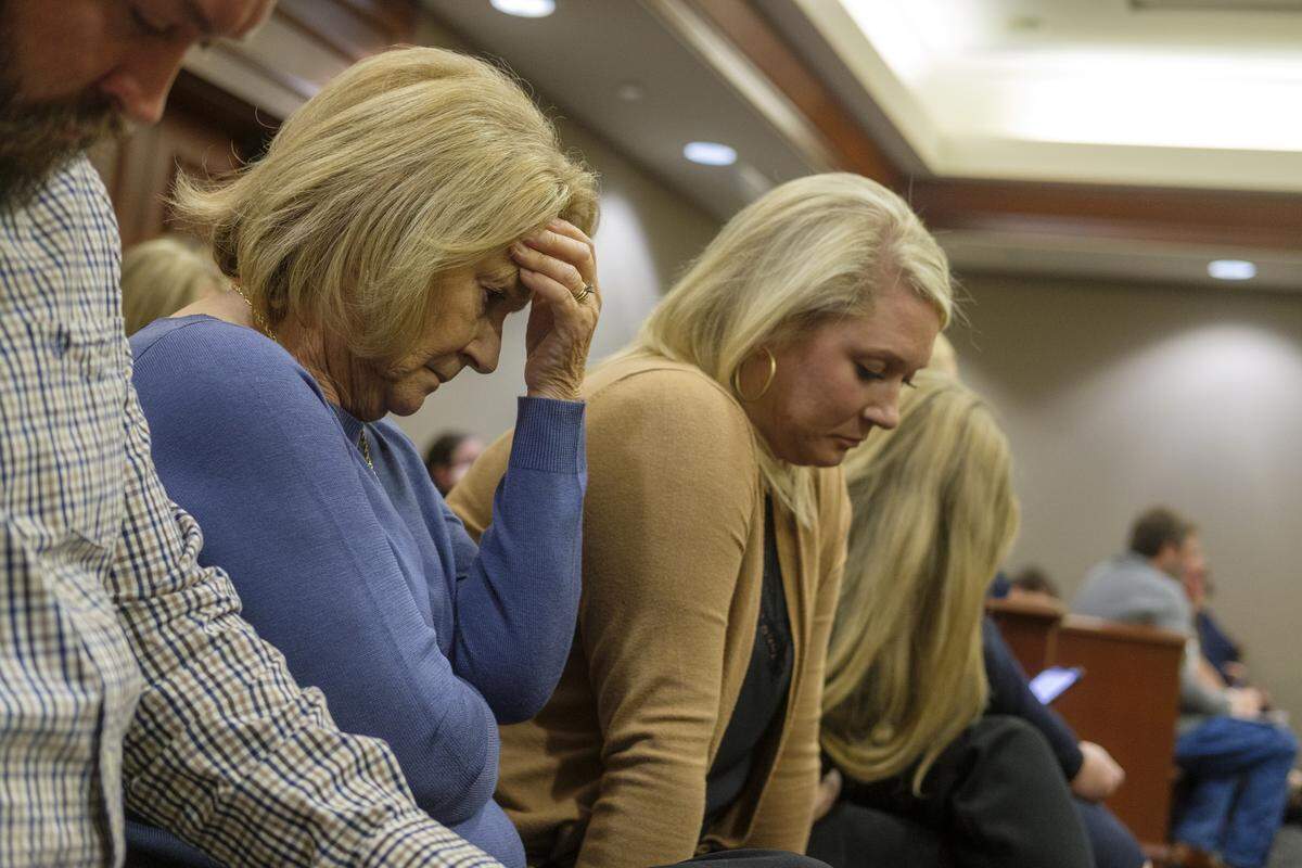 Scott Spivey’s mother, left, Deborah Spivey and sister, Jennifer Foley, listen as 9-11 tapes of witnesses are played from Spivey’s shooting death. A judge heard procedural motions in the civil suit over the shooting death of Scott Spivey by Weldon Boyd and Kenneth "Bradley" Williams in a Conway, SC courtroom on Monday. Nov. 17, 2025.