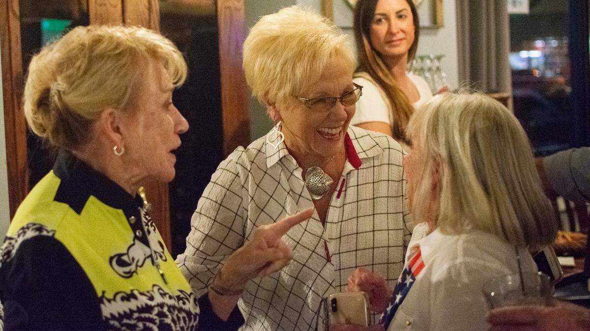 Mayor Marilyn Hatley talks to supporters as they wait for election results ar Midtown Bistro. Unofficial returns show her beating challenger Wayne Troutman.