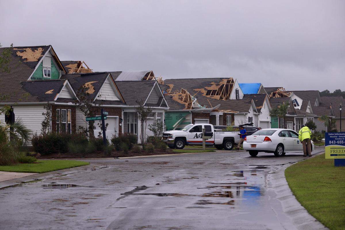 Multiple houses were severely damaged by tornadoes this morning in The Farm at Brunswick, a Carolina Shores community in North Carolina.