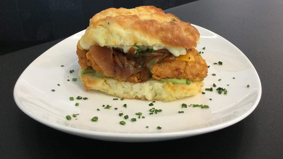 “Hash It Up” at 10/Fold Biscuits features a jalapeno-cheddar biscuit, crispy hash brown, whipped avocado, caramelized onions, cheddar cheese and Duke’s mayonnaise. July 14, 2021.