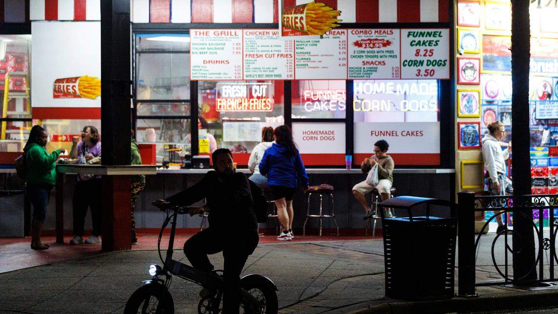 Small groups begin gathering on Ocean Boulevard after a rain storm on Friday, May 30, 2025. The city is looking to enact a permanently stricter curfew for minors in the area. TSN 2025 File.